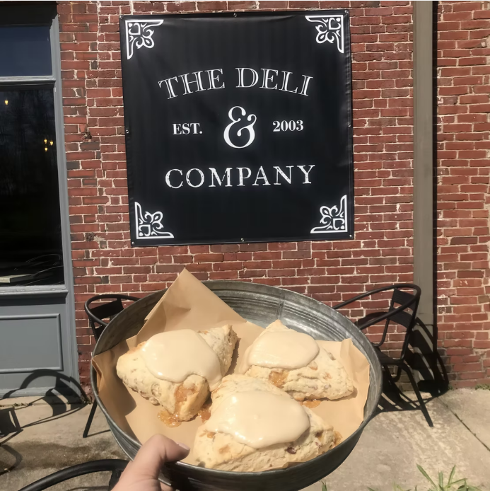 deli & co sign and scones Find us at the deli and company
